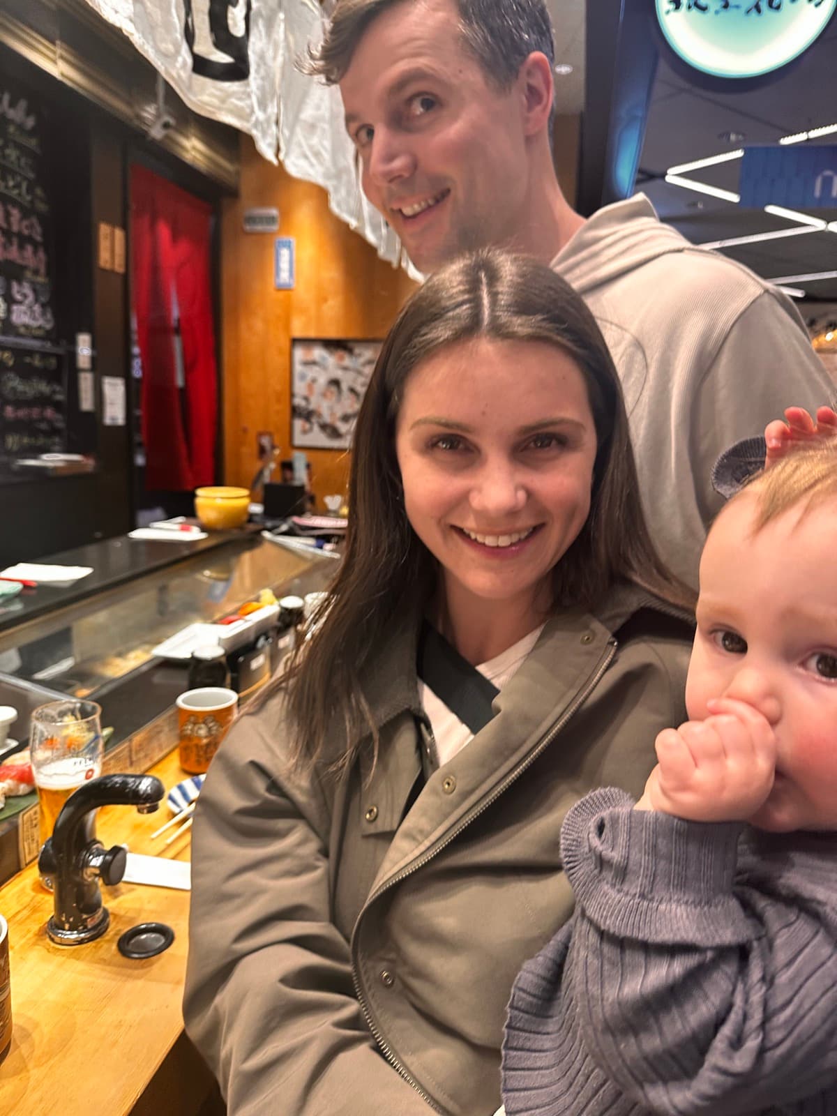 Family with their baby at a Ginza sushi counter