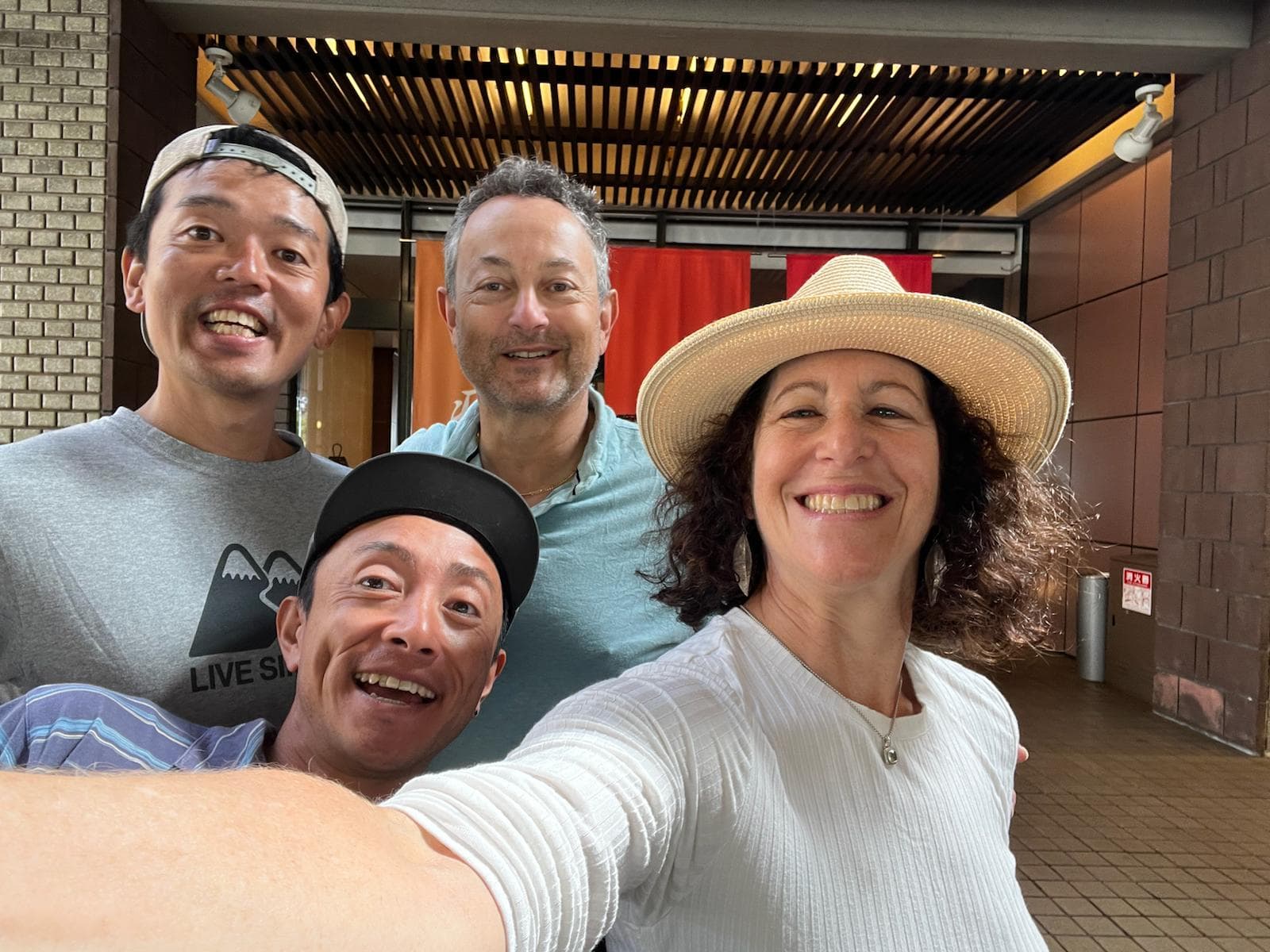 Group selfie with guests